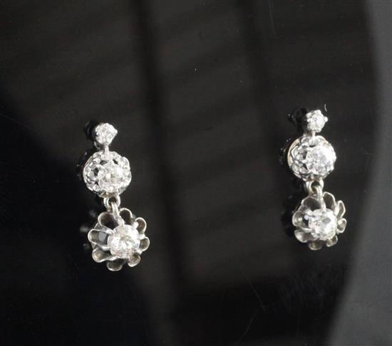 Pair of early 20th century white gold and diamond drop earrings, drop 17mm(-)